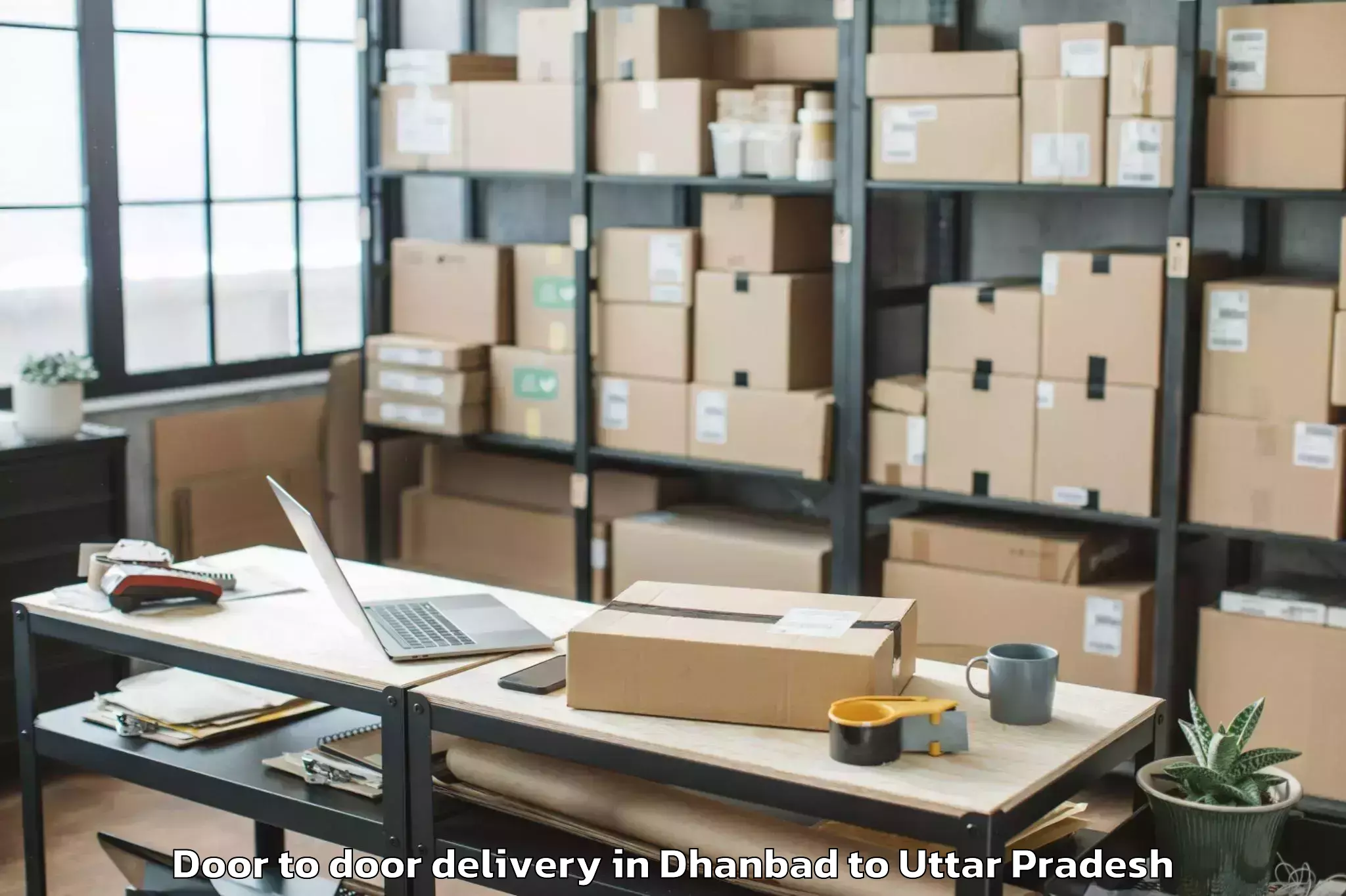 Quality Dhanbad to Manjhanpur Door To Door Delivery